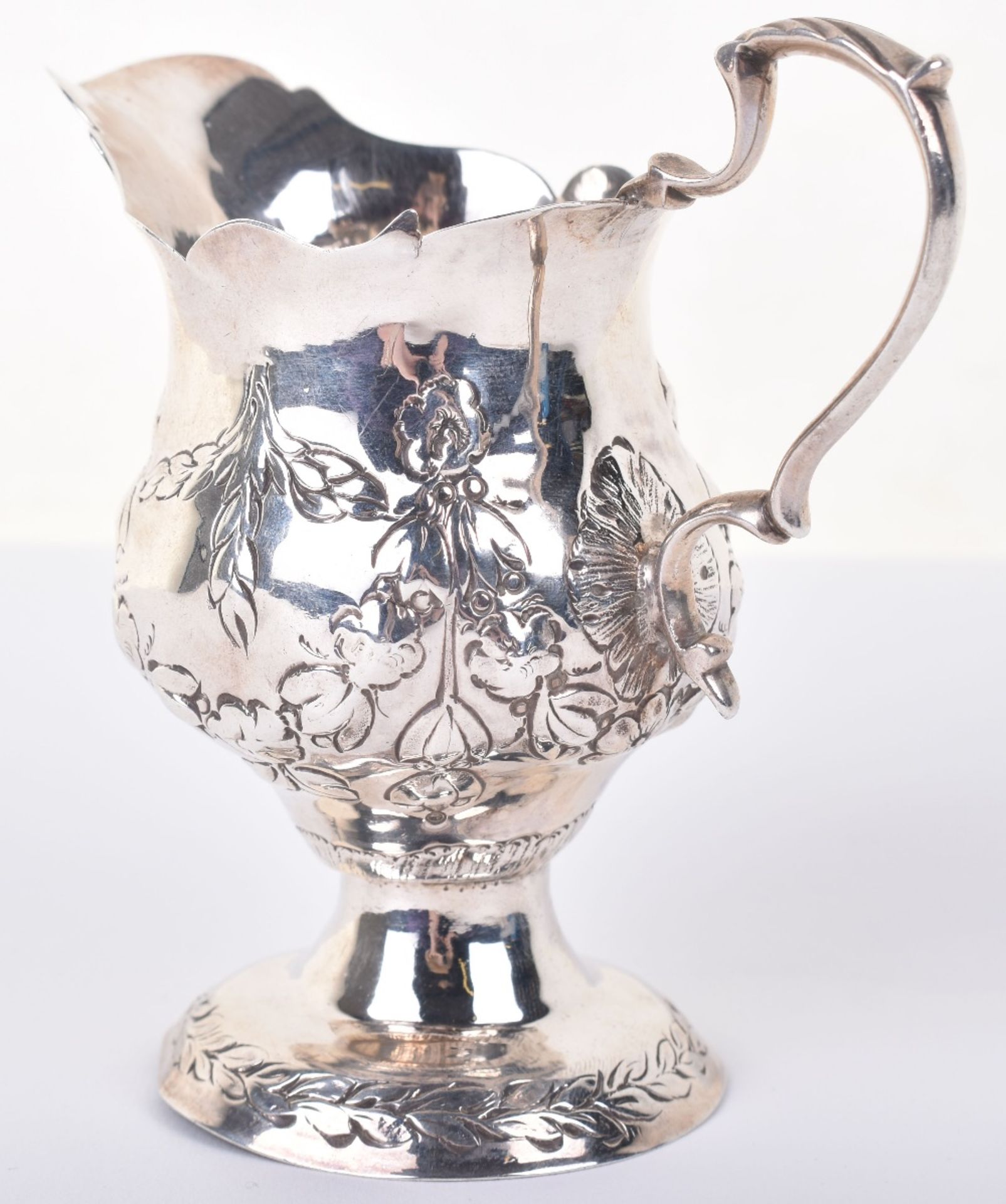 A George III silver cream jug, London 1773 - Image 5 of 9