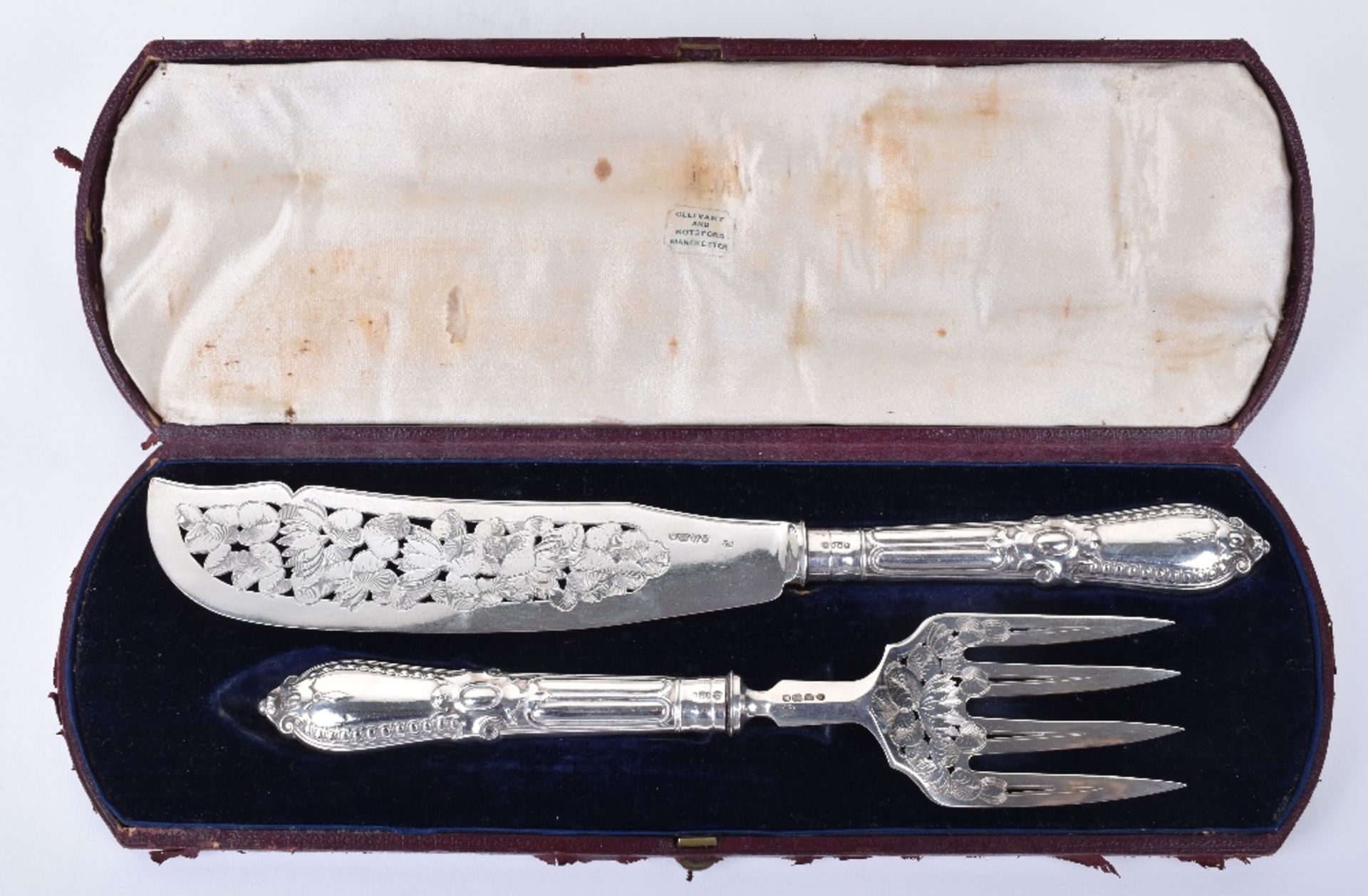 A pair of Victorian silver Grecian fish servers, by George Adams, London 1856