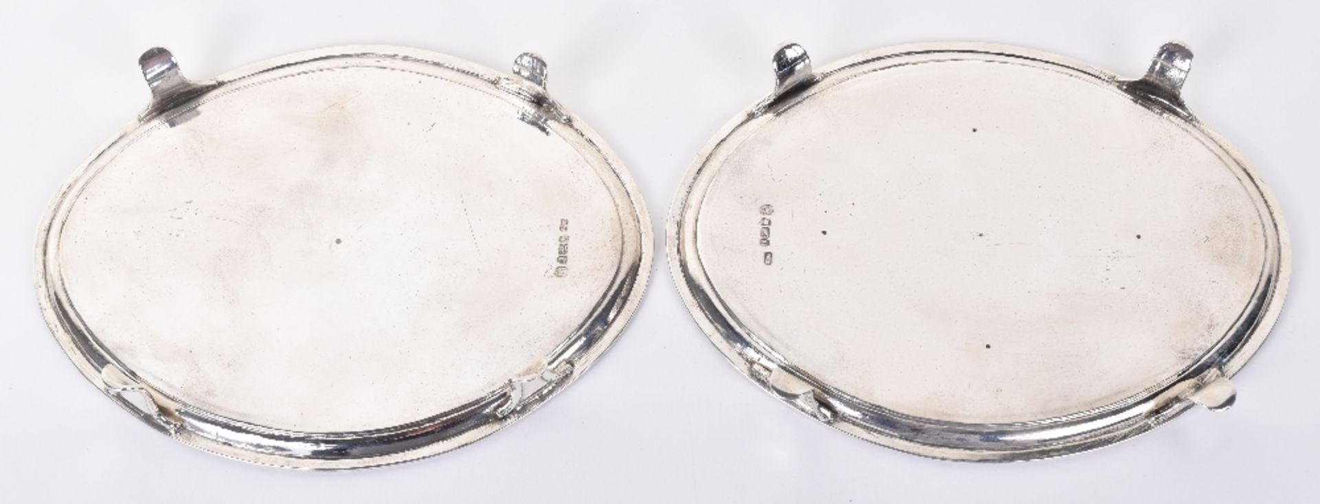 A pair of George III silver salvers, by Thomas Chawner, London 1784 - Image 5 of 6