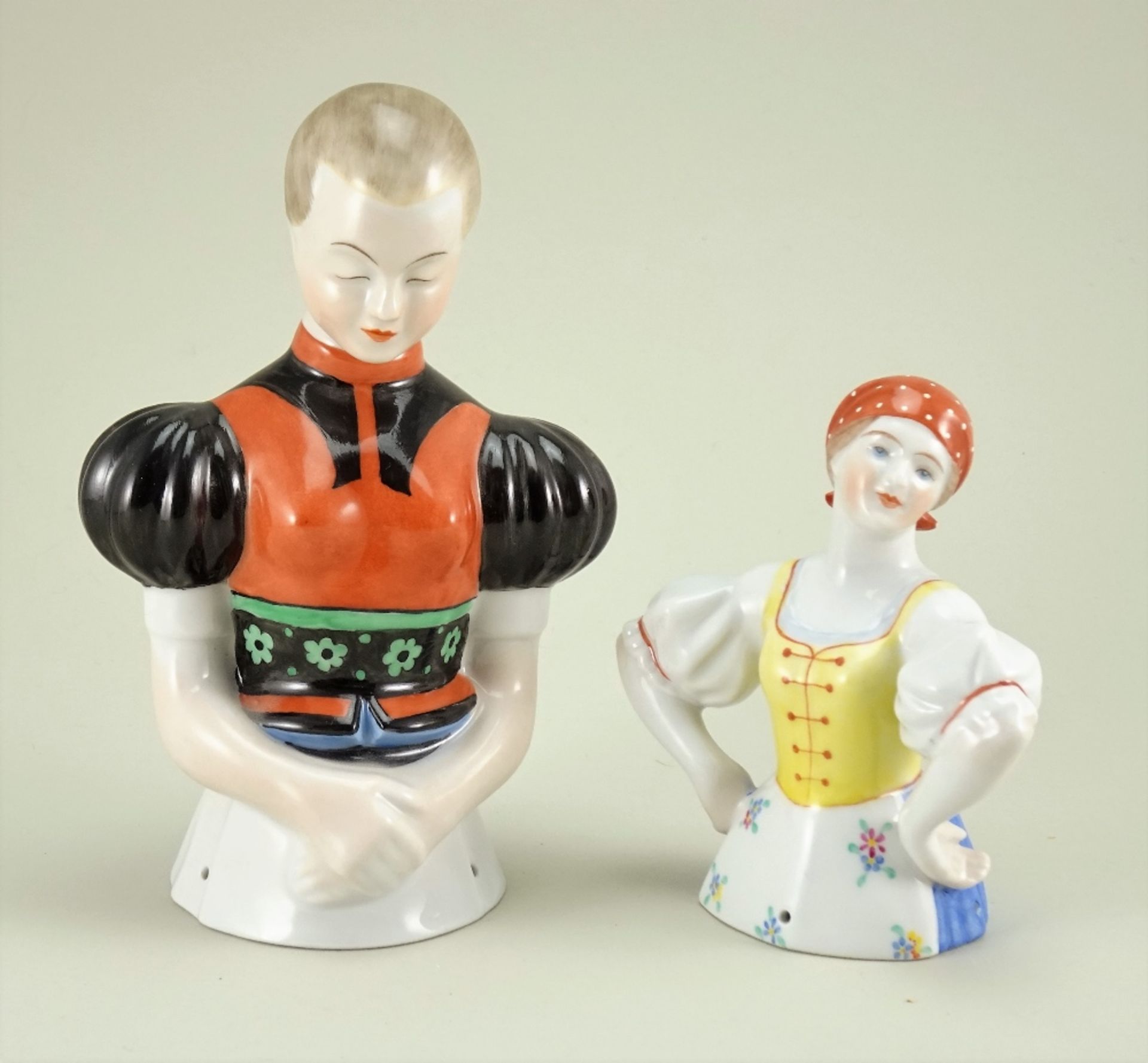 Pair of glazed china half-dolls by Herend of Hungary,