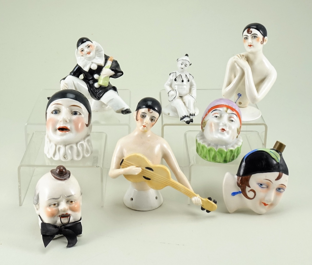 Pierrette and Pierrot glazed china half-dolls and pin cushions,