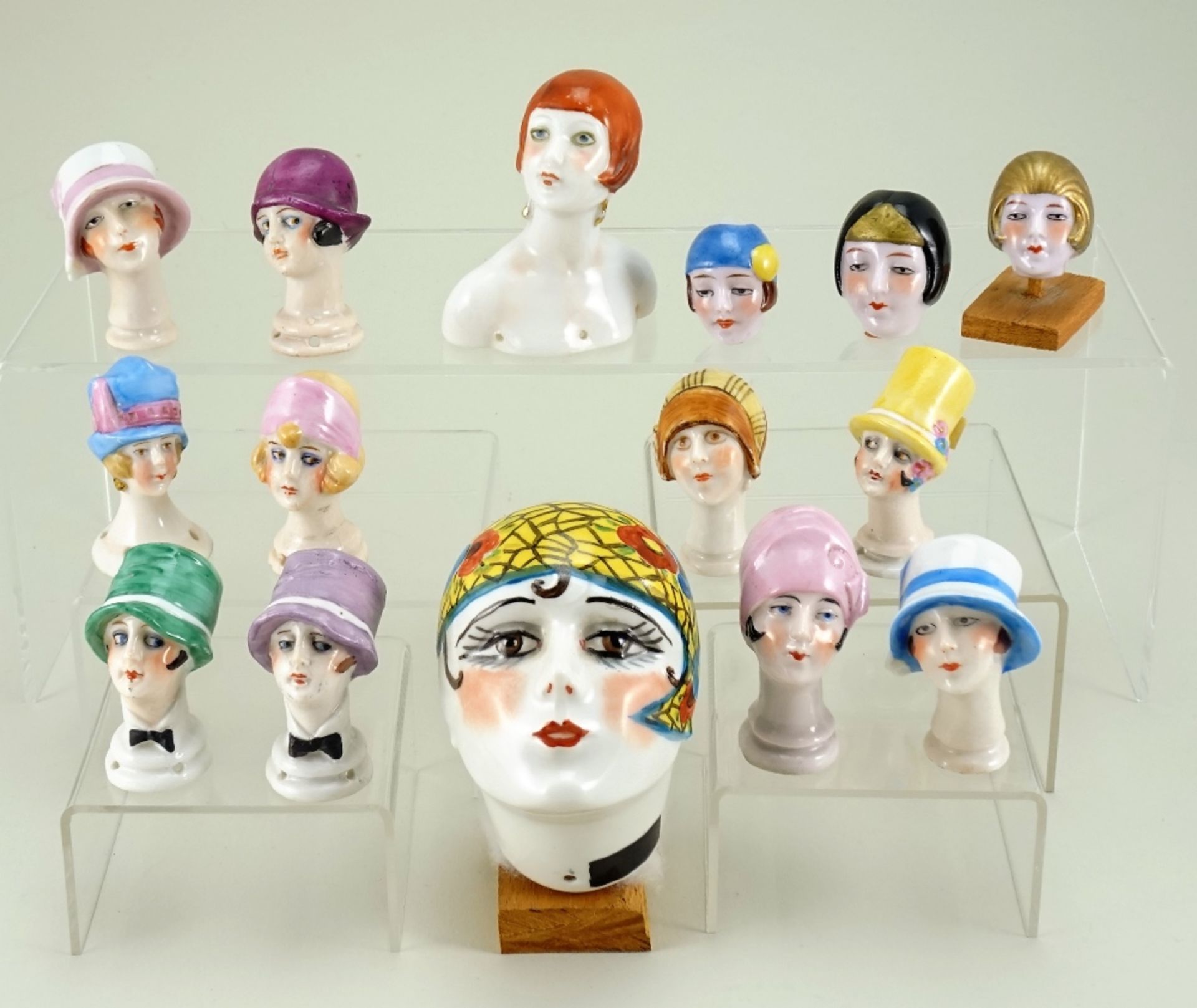 Collection of glazed china Flapper pin cushion heads,