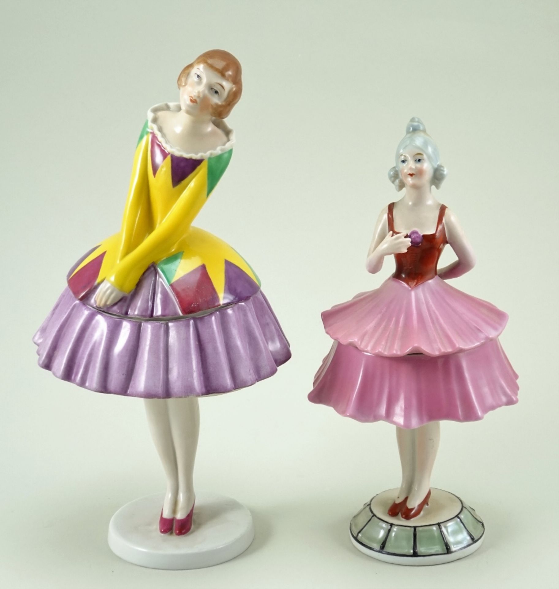 Two glazed china standing lady dressing table powder puffs, 1920s,