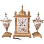 A 19th century French ormulo and porcelain clock garniture, by Japy Freres Paris