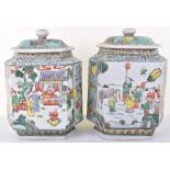 A pair of Chinese famille verte lidded vases