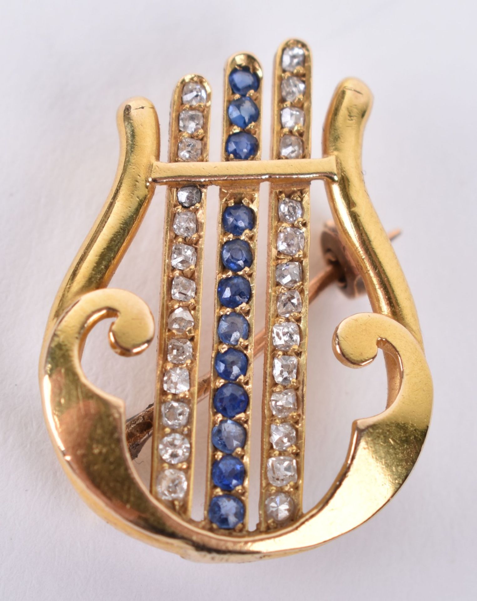 An unmarked gold, diamond and sapphire brooch - Image 2 of 4