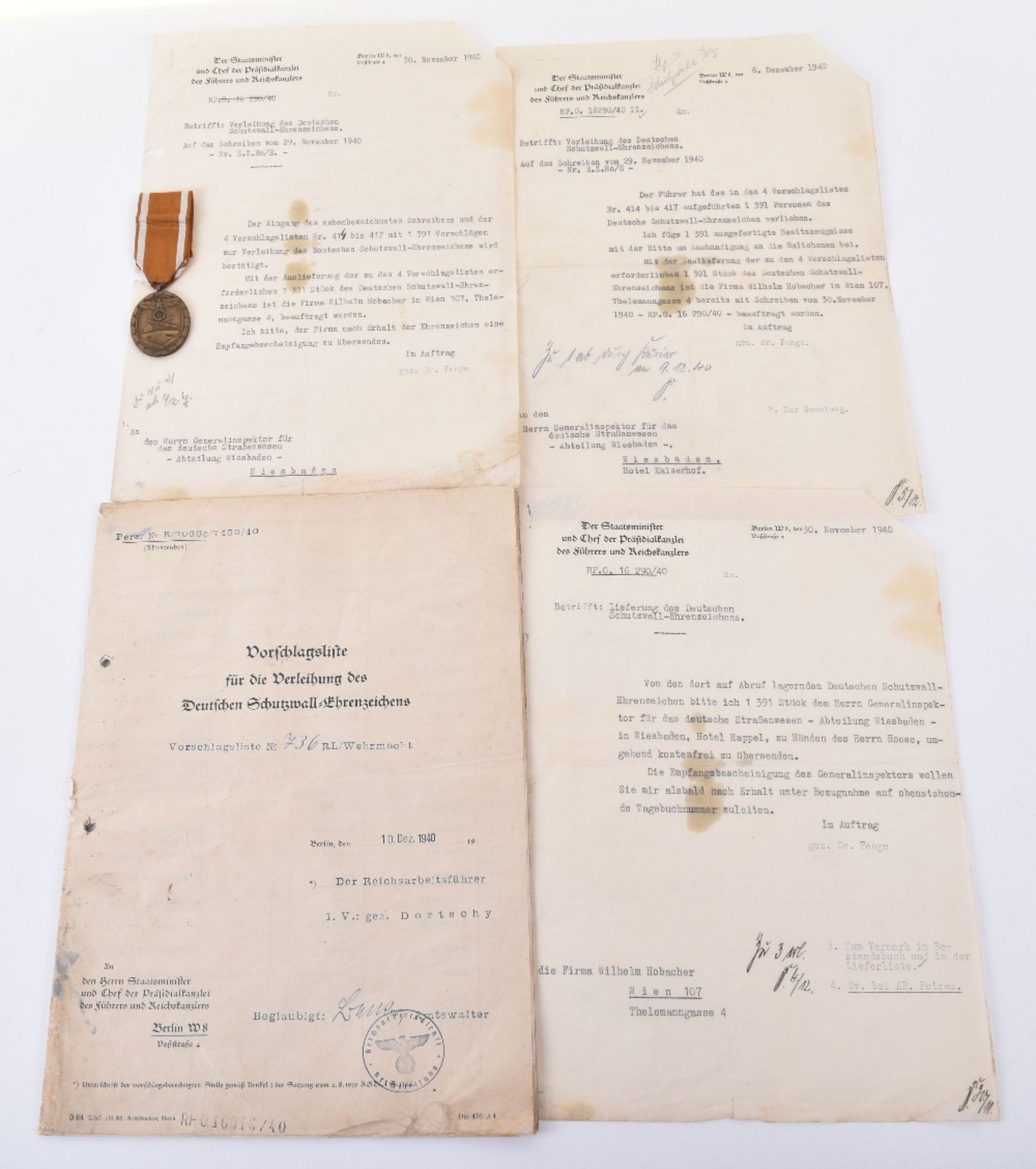 Interesting Grouping of Third Reich Documents Relating to the Awarding of the West Wall Campaign Med