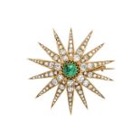 Star brooch in yellow gold, diamonds and emerald