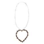 Large heart pendant in yellow gold, diamonds and smoky quartz