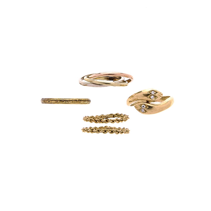 Lot of five rings in yellow gold, low-title gold and diamonds