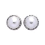 Pair of clip earrings in white gold and mabe pearls