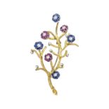 Brooch en tremblant in yellow gold, diamonds, sapphires and rubies