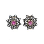 Pair of clip-on earrings in yellow gold, silver, diamonds and ruby