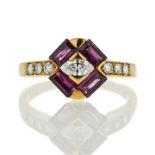 Ring in yellow gold, diamonds and rubies