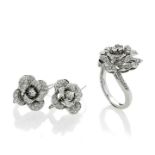 Pair of earrings and ring in white gold and diamonds