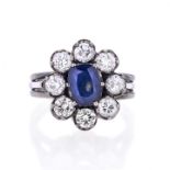 Daisy ring in white gold, diamonds and sapphire