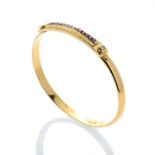 Bangle in yellow gold, diamonds and rubies