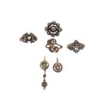 Lot of four rings and a pair of low-titled gold earrings, silver, diamond roses and stones