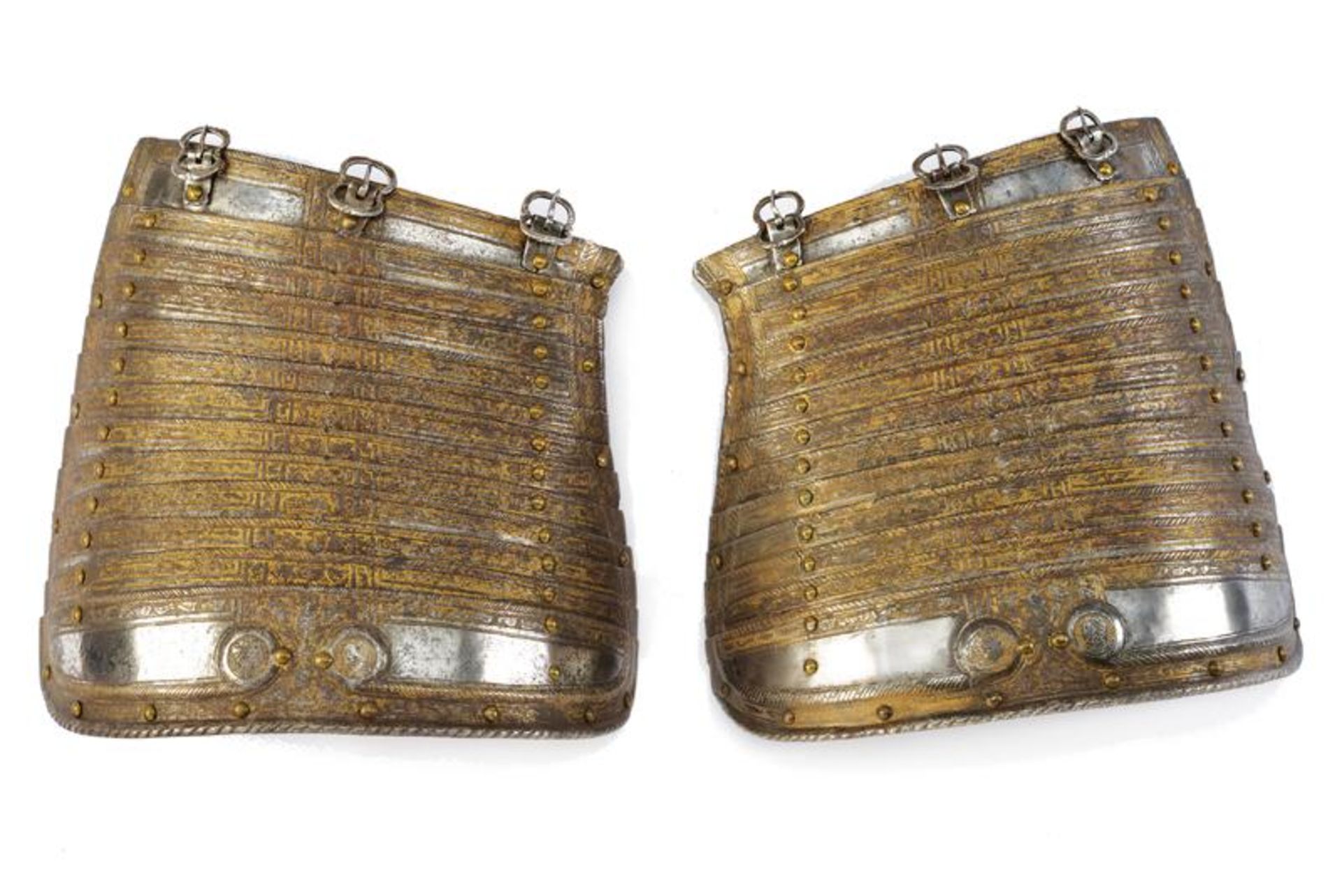 A beautiful pair of engraved and gilded tassets in pisan style