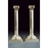 A pair of silver candleholders