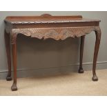 Georgian style mahogany side table, raised back, acanthus and floral carved and shaped apron,