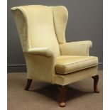 Parker Knoll beech framed wingback armchair,