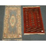Bokhara red ground rug, geometric medallions (78cm x 120cm),