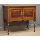 Early 20th century oak washstand two panelled doors, stile turned supports, W91cm, H76cm,