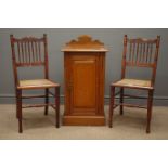 Early 20th century oak bedside cabinet, raised shaped back, single panelled door, plinth base,