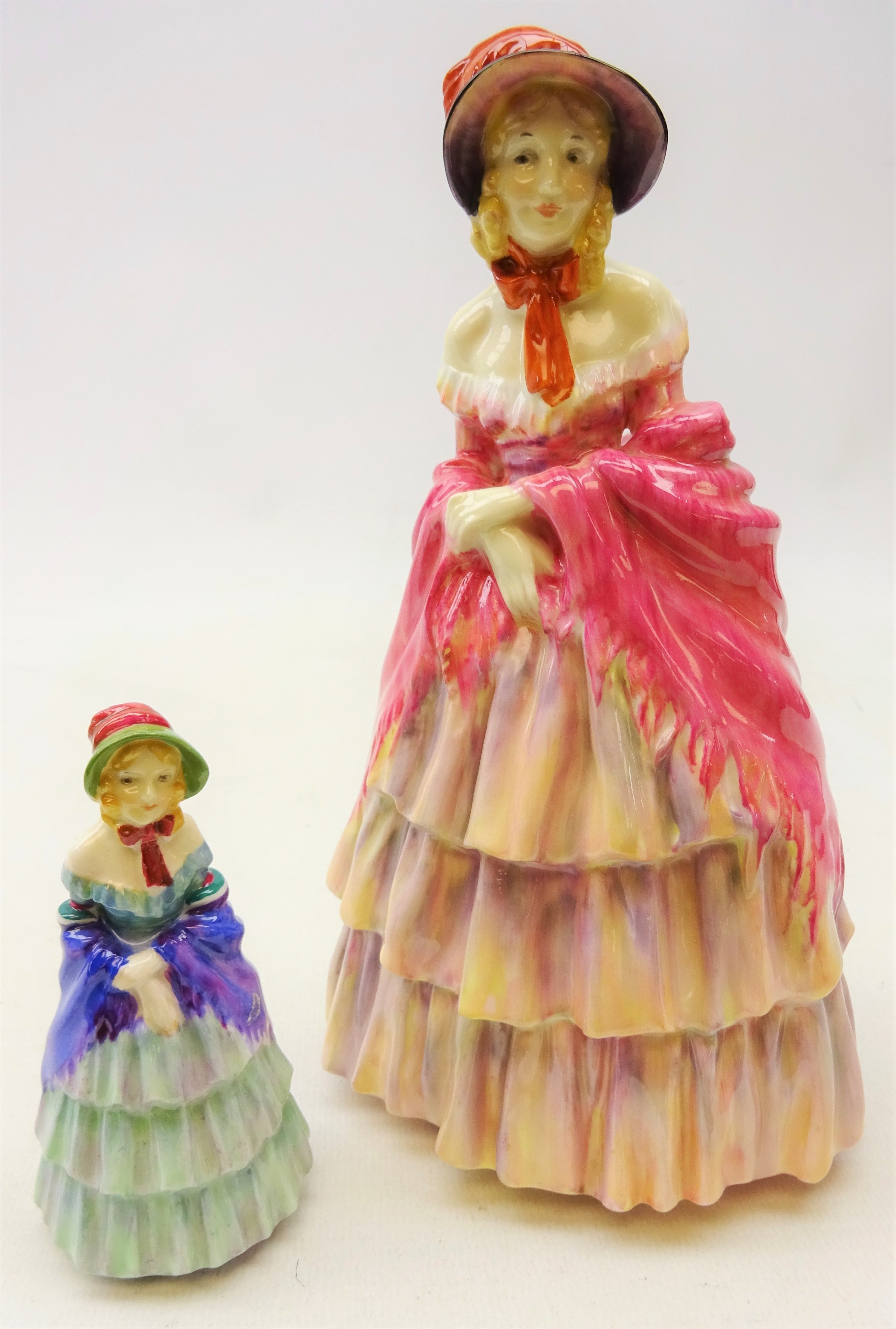 Two early Royal Doulton figures entitled 'A Victorian Lady' HN727 and M2,