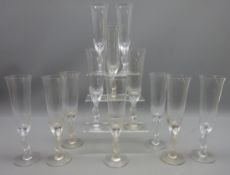 Set of twelve Igor Carl Faberge champagne flutes, the stem modelled as two kissing snow doves,