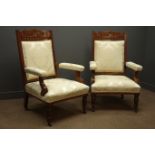 Pair Edwardian walnut framed drawing room arm chairs, carved floral cresting rail,
