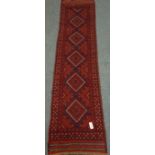 Meshwani red and blue ground runner rug,