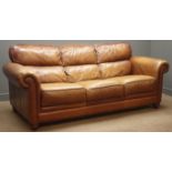 Traditional shaped three seat sofa upholstered in tan leather,