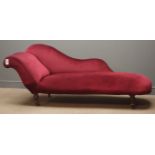 Early 20th century chaise longue, upholstered in red velvet, turned supports,