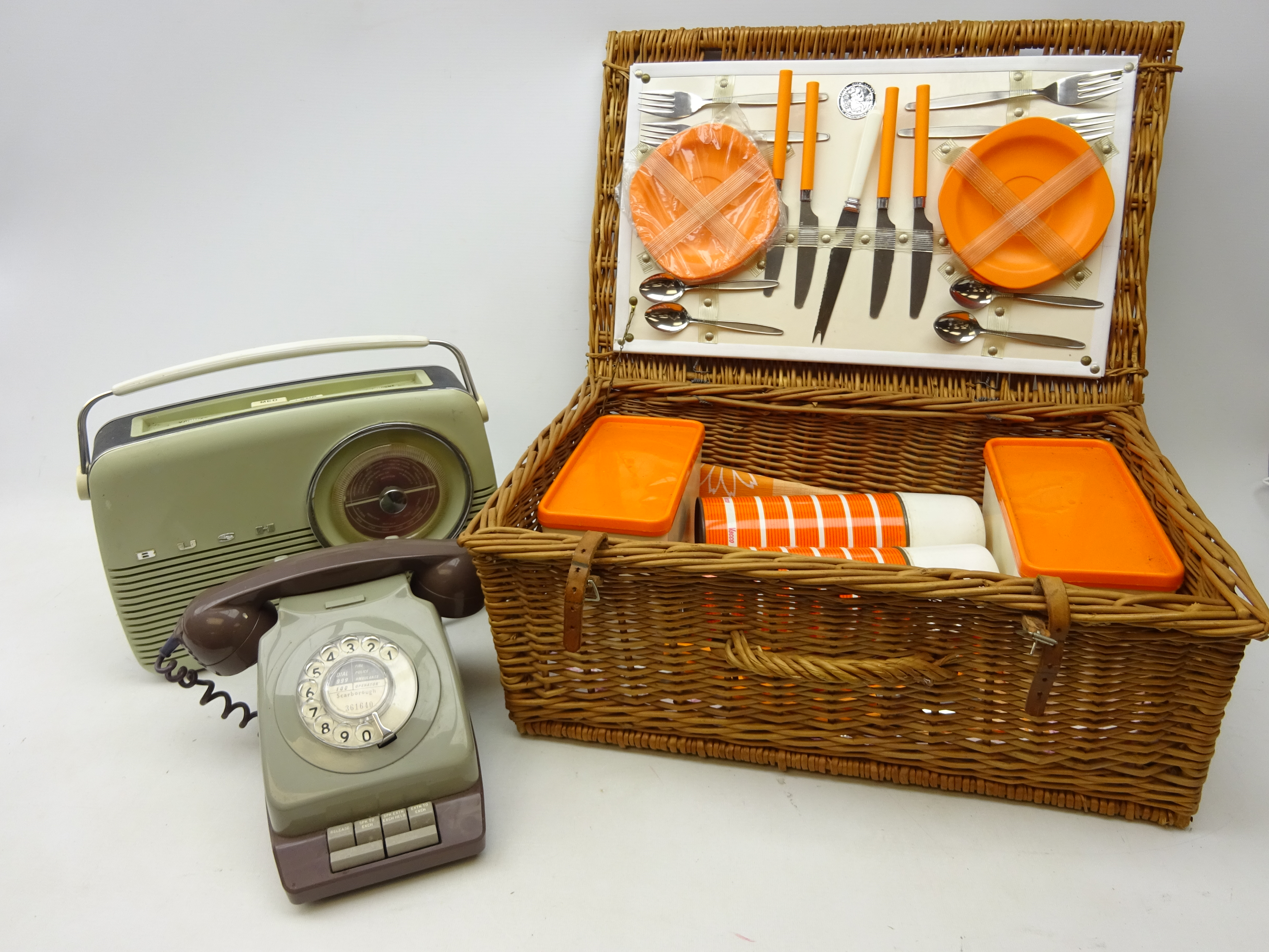 Vintage Bush radio, Vintage dial-up telephone and a wicker picnic hamper with contents,