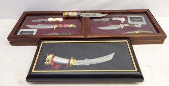 Eight Franklin Mint knives, short 'Samurai Sword' with dragon decoration, in display case,