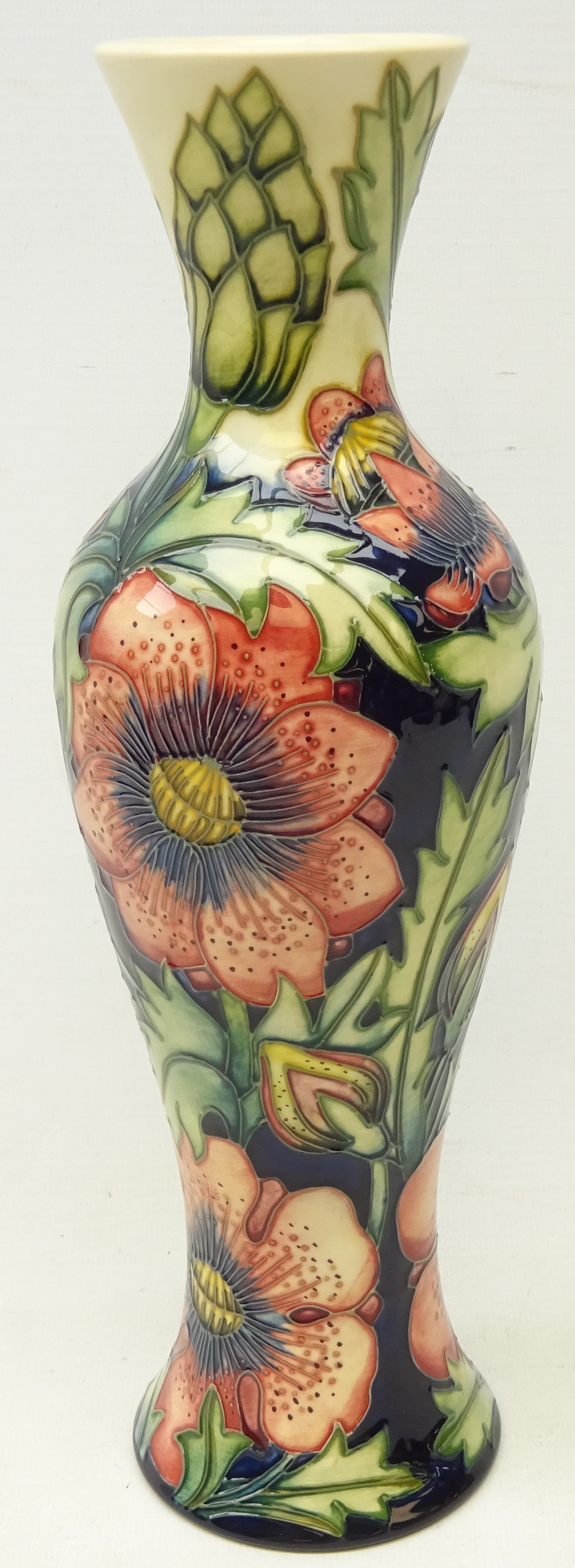 Moorcroft vase of inverted baluster form tube lined in the 'Pheasant's Eye' pattern designed by