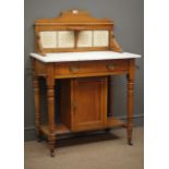 Edwardian marble top washstand, raised tiled back, single drawer, metal towel rail to the side,