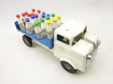 Tri-ang tinplate model of a Milk Float, white & blue with twenty bottles,