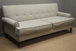 Two seat Neptune 'Empire' sofa, upholstered in grey fabric, scrolled arms, turned supports,