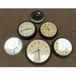 Four 'Smiths' circular bakelite slave clocks,