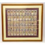 Framed John Player & Sons cigarette cards including Don Bradman,