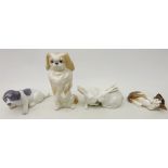 Three Royal Copenhagen models, Pekingese Dog, no. 1766, two Rabbits no. 518 and a Pointer Puppy no.