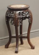 Late 19th century Oriental hardwood jardiniere, marble insert to circular top,