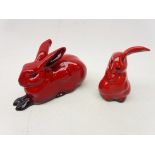 Two Royal Doulton flambe figures of a reclining hare L11cm and a seated rabbit (2)