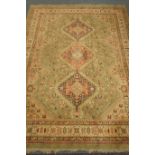 Persian style, green ground carpet, triple pole medallion,