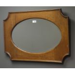 Early 20th century oak framed mirror, oval bevel edged plate, W80cm,