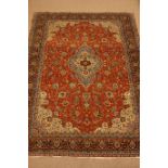 Persian Sarough red ground rug carpet, light blue medallion repeated in border guards,