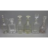 Pair of 19th century facet and ring cut mallet shaped decanters each with mushroom stopper and